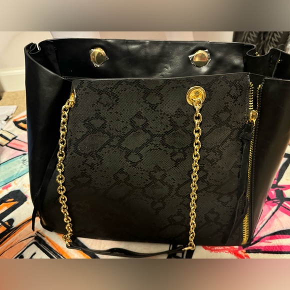 Like new Bebe black snack print tote/ shoulder bag with gold chain straps - Picture 5 of 14